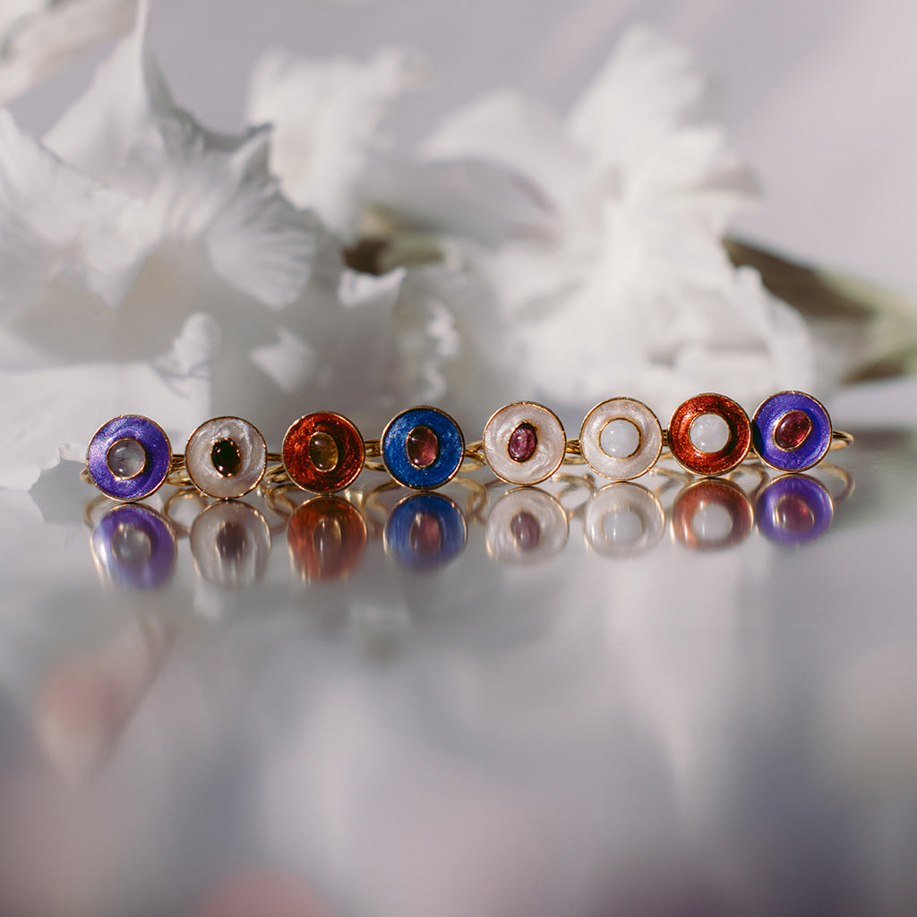 Colorful rings made of enamel and natural stones